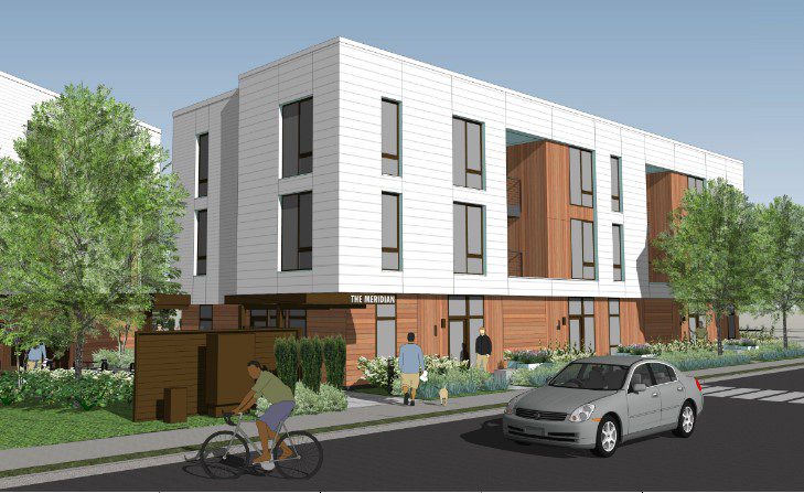 A rendering of a three-story affordable housing development. 
