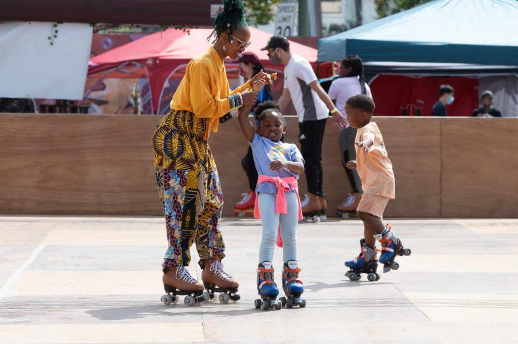 Family skating at Akoma market.