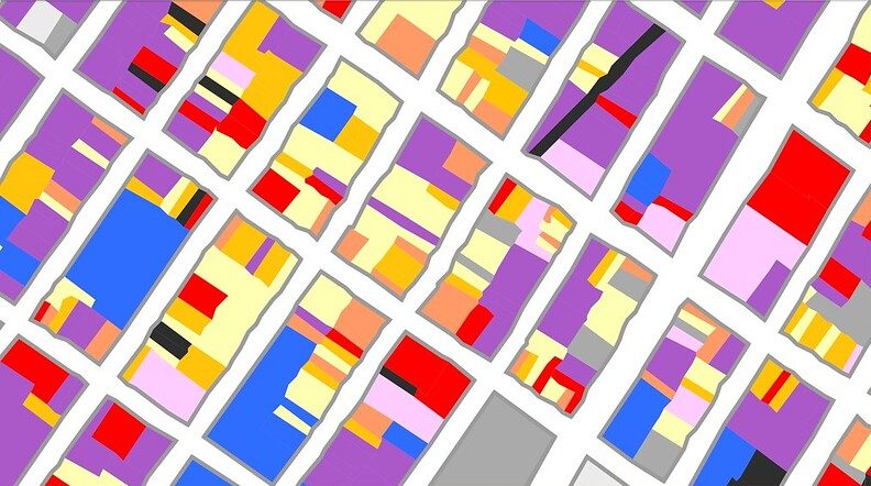 A brightly colored but unlabeled zoning map of Long Island City, used to illustrate article on inclusionary zoning