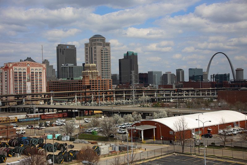 View of St. Louis from afar, with the arch at far right.