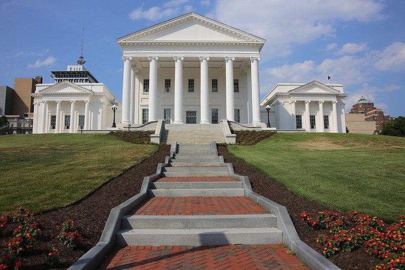 The Virginia State Capital seen frmo the bottom of the steps leading up to it, on a sunny day.