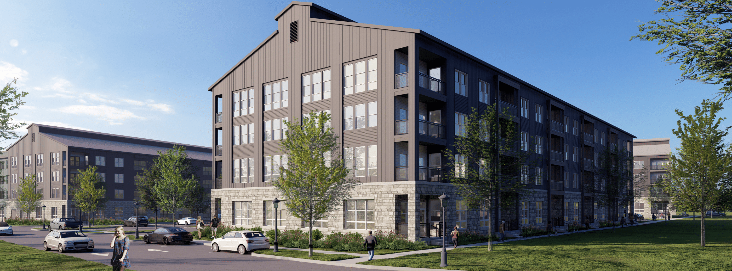 A rendering of an apartment complex featuring at least three large, four-floor gray buildings with stone exteriors at the ground levels. The buildings are set next to a parking lot on one side and a lawn with trees on the other side. Sidewalks connect the buildings. Renderings of people and cars are shown in the foreground.